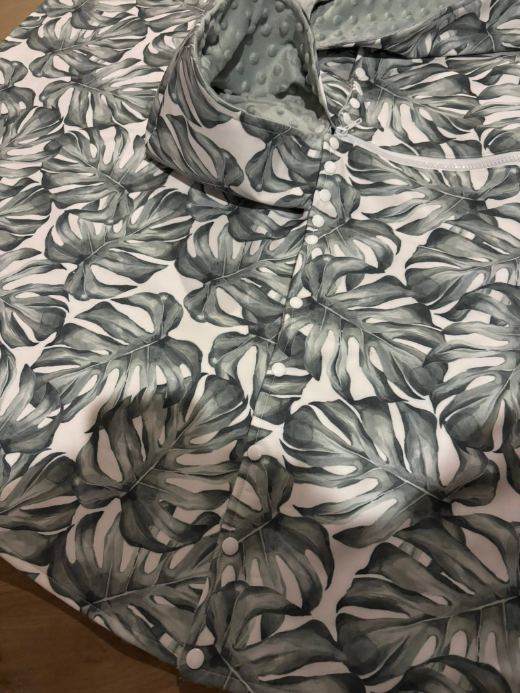 Poncho — sleeve buttons